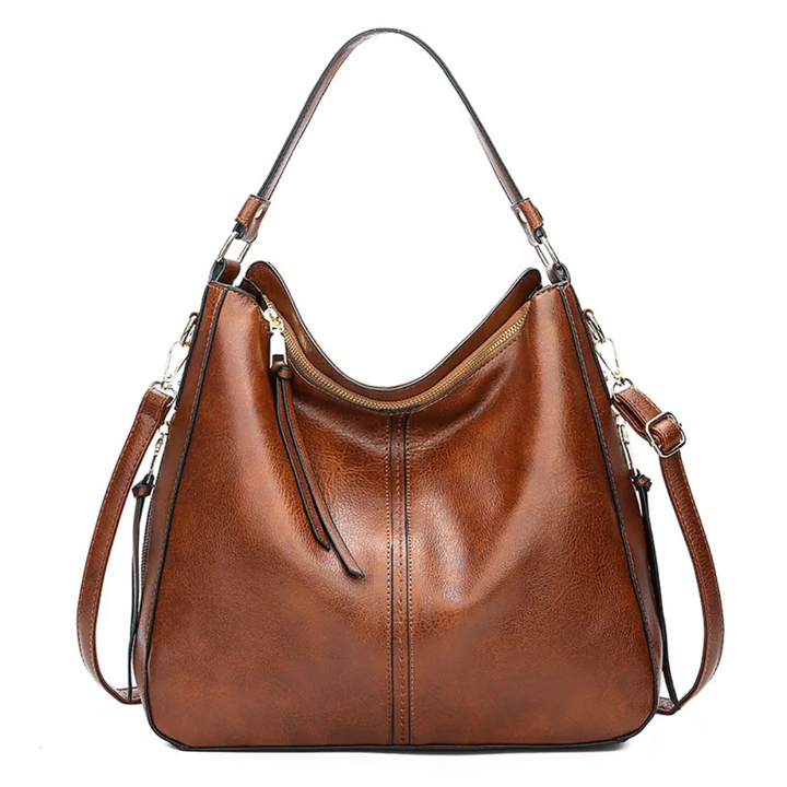 "Elegante rode hobo tas voor dames met vintage charme, ruim interieur, ideaal voor dagelijks gebruik in stijl."