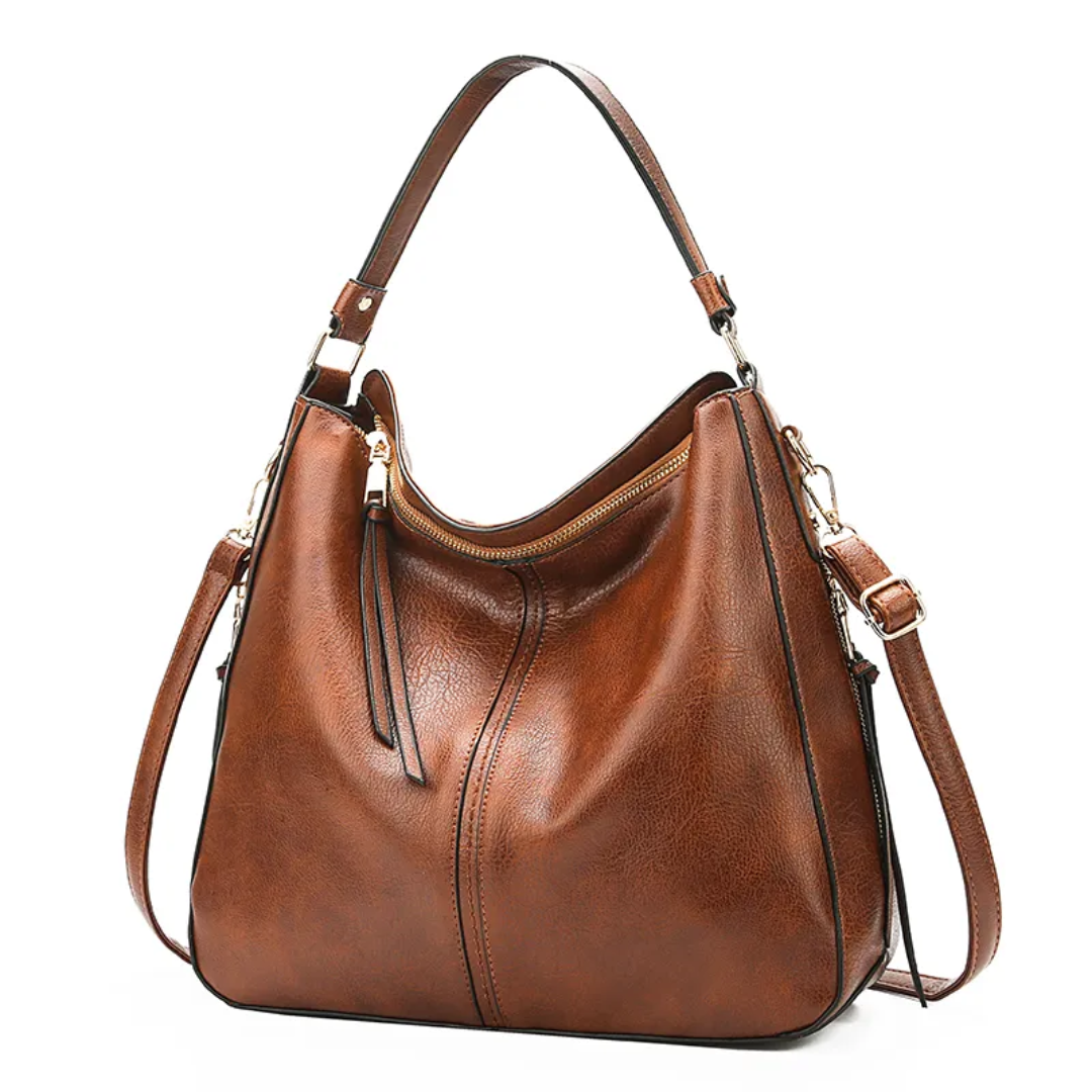 "Elegante rode hobo tas voor dames met vintage charme, ruim interieur, ideaal voor dagelijks gebruik in stijl."
