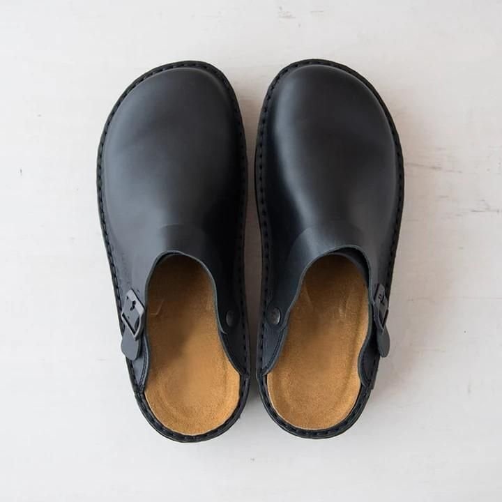 Elegante slip-on leren klompen voor dames, bruin leer met ergonomisch ontwerp, voor dagelijks comfort en stijl.