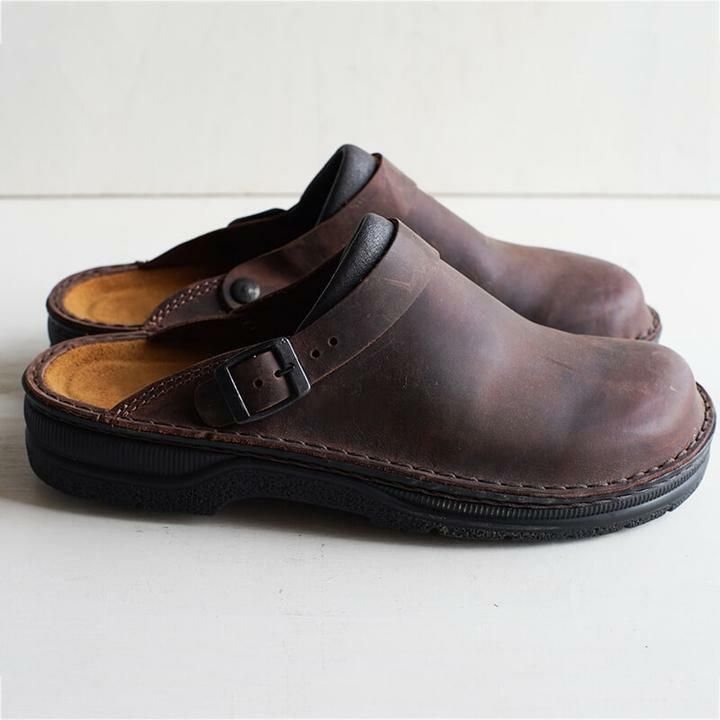 Elegante slip-on leren klompen voor dames, bruin leer met ergonomisch ontwerp, voor dagelijks comfort en stijl.