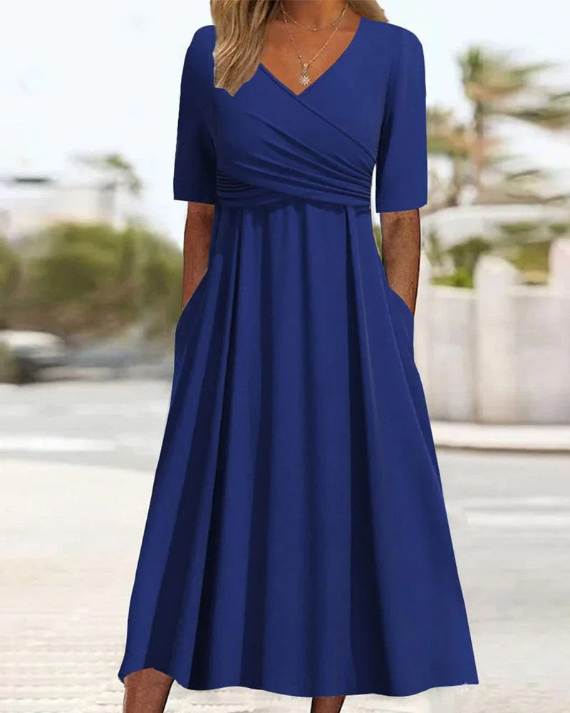 "Elegante vintage V-hals jurk, korte mouwen, damesmode in veelzijdige kleuren, flatterend en comfortabel materiaal."