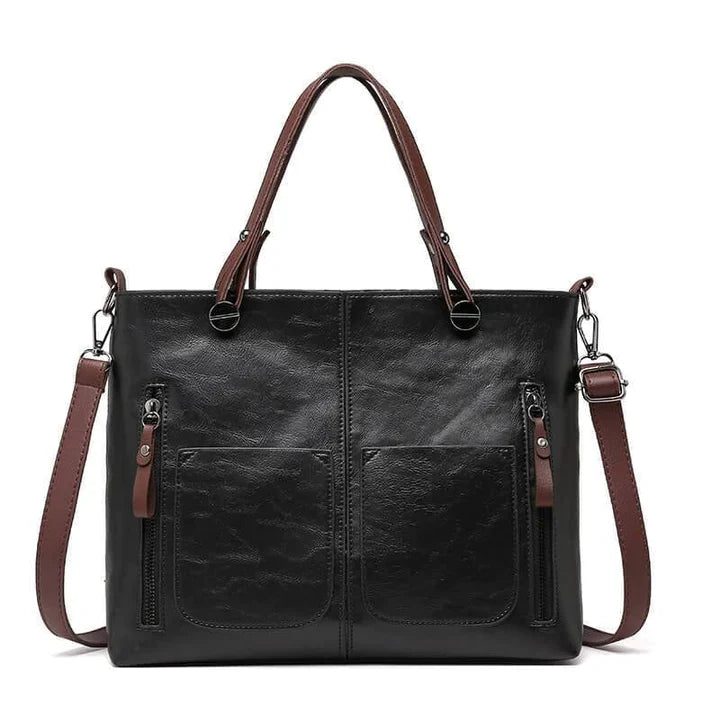 "Elegante vintagestijl leren schoudertas voor dames met bruine tinten, perfect voor een klassieke en tijdloze look."