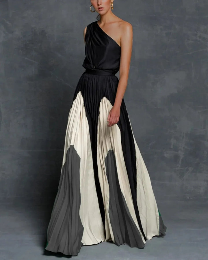 "Elegante zwarte maxi-jurk met één schouder; soepel vallend voor speciale gelegenheden. Perfecte damesjurk voor een verfijnde