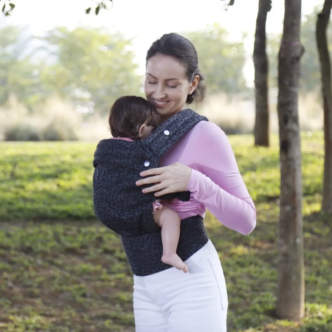 "Ergonomische babydrager met unisex design, verstelbare schouderbanden en ademend katoen voor comfort en veiligheid baby's."