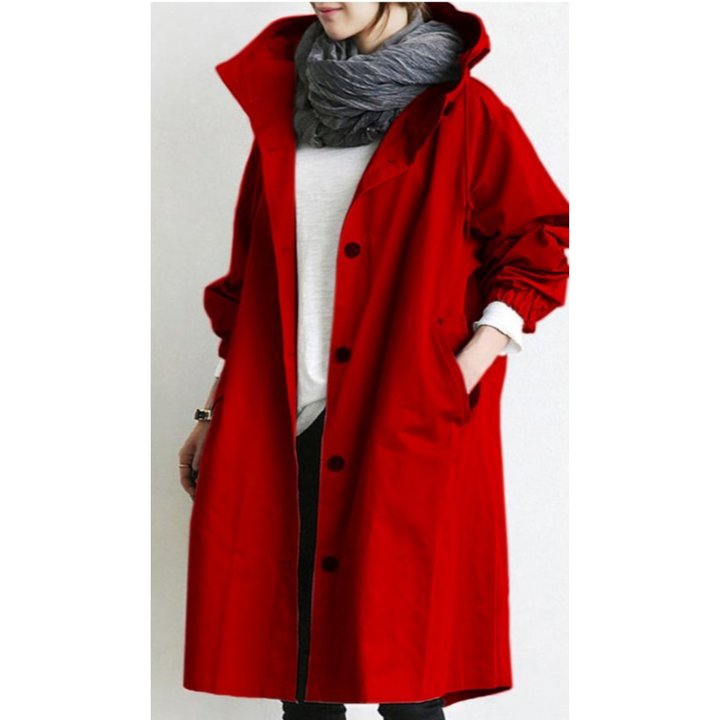 "Esmée lange dames trenchcoat zwart, elegant, wind- en waterdicht met capuchon en verstelbare taille voor perfecte pasvorm."