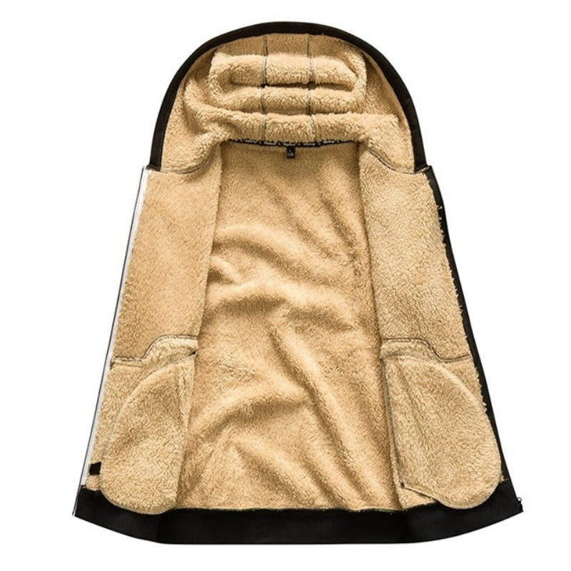 "Gedetailleerd gebreid heren wintervest met zachte wolvoering en ritssluiting; stijlvolle en warme keuze voor de winter."
