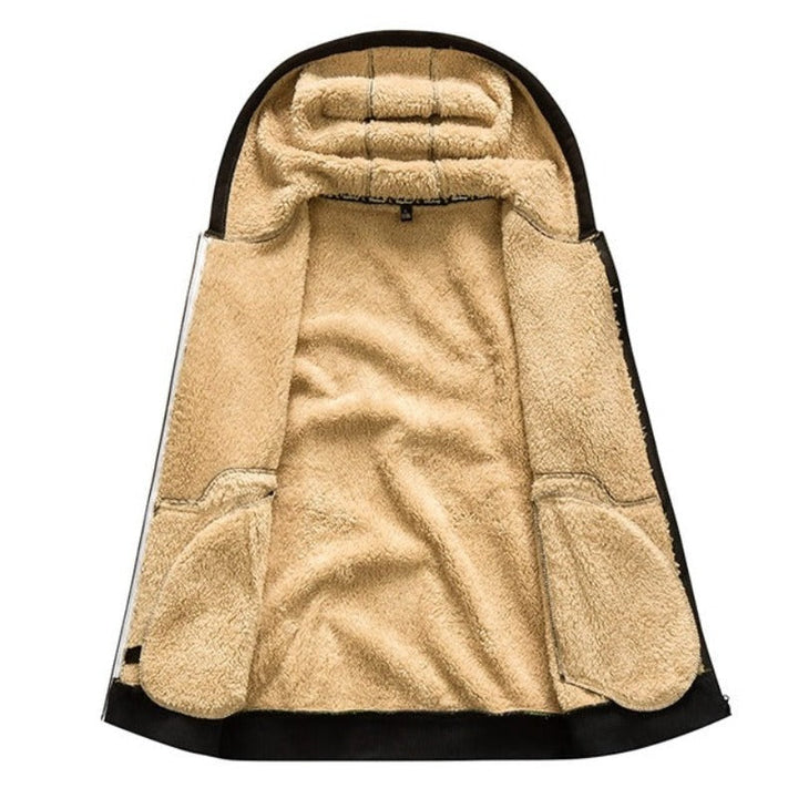 "Gedetailleerd gebreid heren wintervest met zachte wolvoering en ritssluiting; stijlvolle en warme keuze voor de winter."
