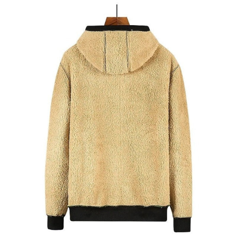 "Gedetailleerd gebreid heren wintervest met zachte wolvoering en ritssluiting; stijlvolle en warme keuze voor de winter."