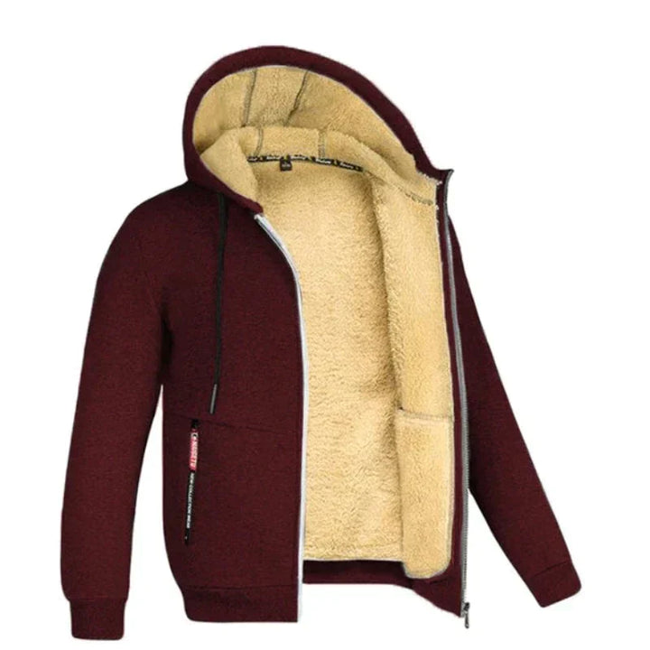 "Gedetailleerd gebreid heren wintervest met zachte wolvoering en ritssluiting; stijlvolle en warme keuze voor de winter."