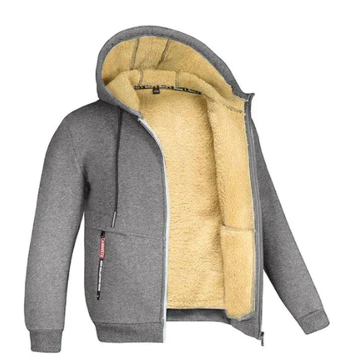 "Gedetailleerd gebreid heren wintervest met zachte wolvoering en ritssluiting; stijlvolle en warme keuze voor de winter."