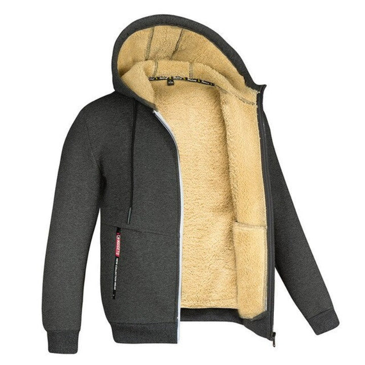 "Gedetailleerd gebreid heren wintervest met zachte wolvoering en ritssluiting; stijlvolle en warme keuze voor de winter."