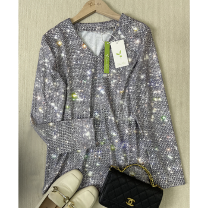 "Glamoureuze dames glitter blouse met sprankelende pailletten en V-hals, ideaal voor feestelijke gelegenheden."