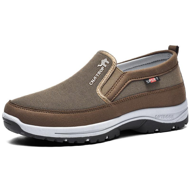 "Grijze heren orthopedische wandelschoenen met stevige zolen en demping, ideaal voor outdoor avonturen en dagelijks comfort."