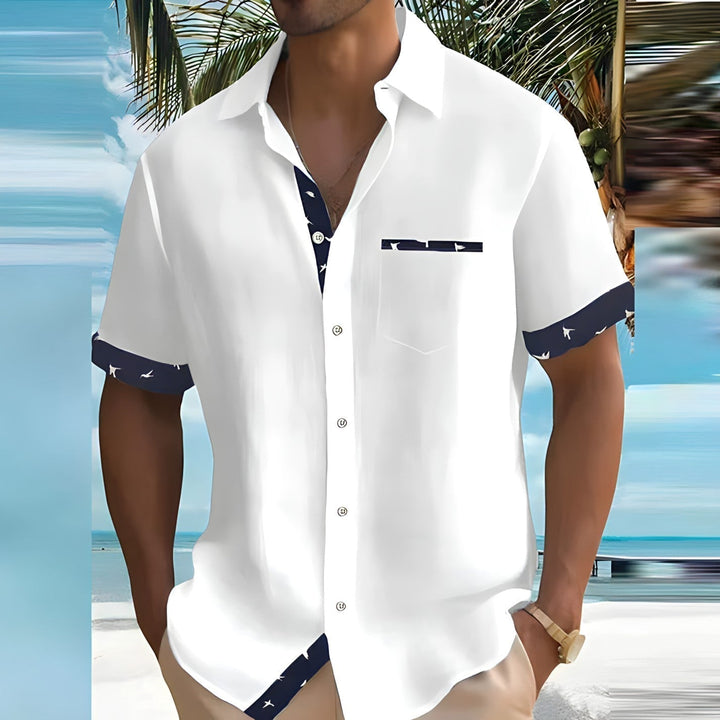 Heren overhemd met korte mouwen en een kleurrijke vogelprint, perfect voor de zomer en ideaal voor casual gelegenheden.