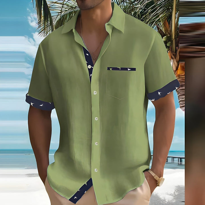 Heren overhemd met korte mouwen en een kleurrijke vogelprint, perfect voor de zomer en ideaal voor casual gelegenheden.