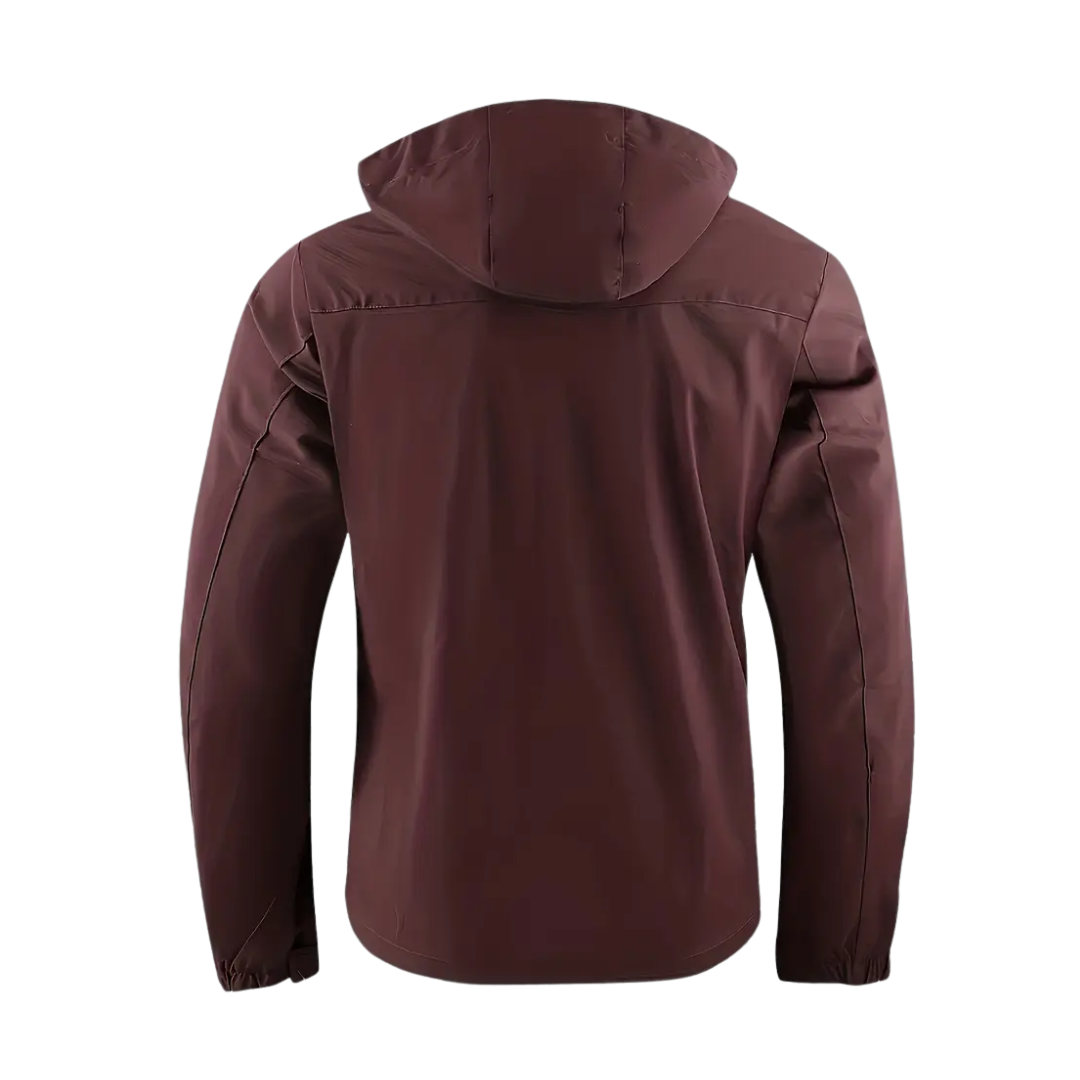 "Heren softshell outdoor jack, wind- en waterdicht, blauw met verstelbare capuchon, ideaal voor herfstwandelen."