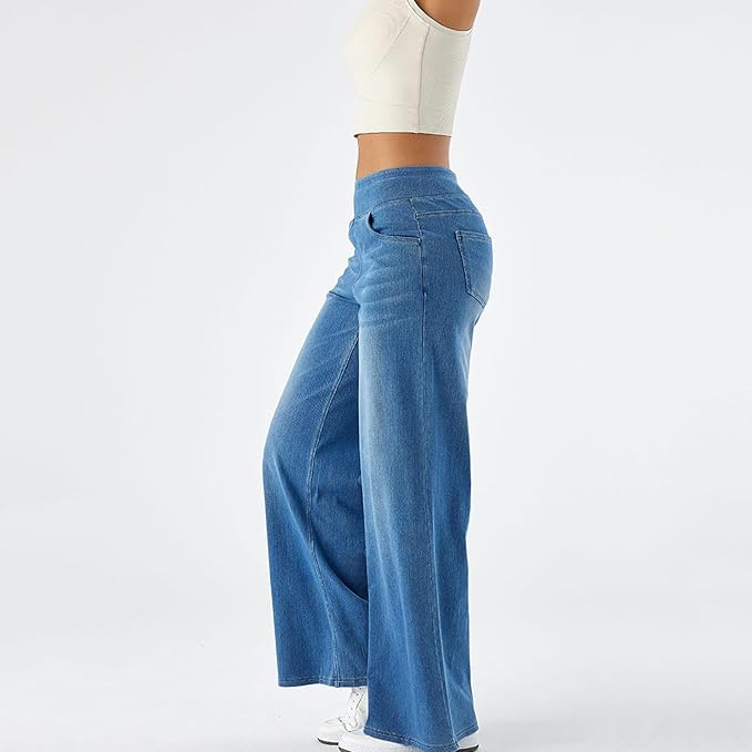 "High-waist wide-leg jeans met elastische tailleband, wijde pijpen, blauwe denim kleur, moderne pasvorm voor dames."