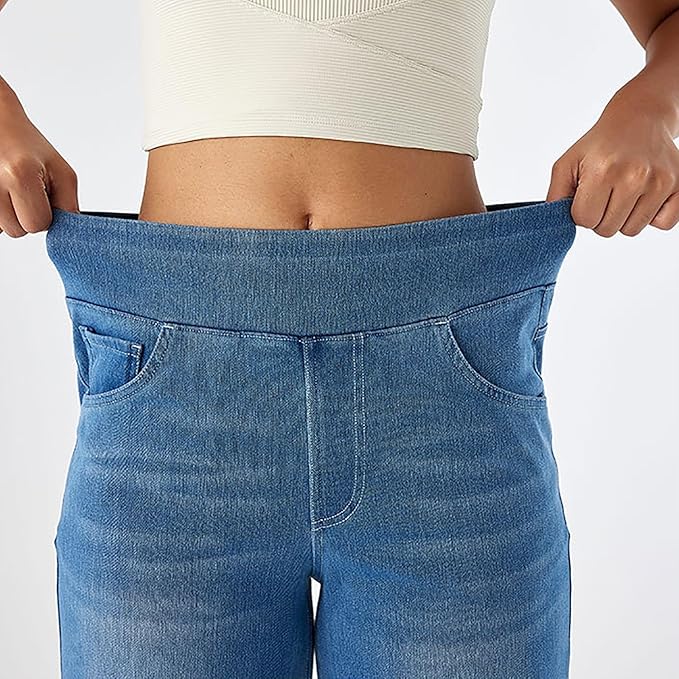 "High-waist wide-leg jeans met elastische tailleband, wijde pijpen, blauwe denim kleur, moderne pasvorm voor dames."
