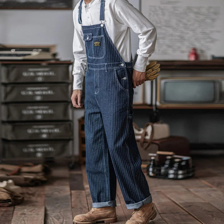 "Indigo denim overalls heren, vintage stijl, zes zakken, slanke pasvorm, hoge duurzaamheid, ademend katoen."