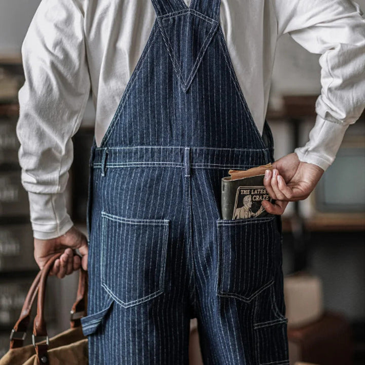 "Indigo denim overalls heren, vintage stijl, zes zakken, slanke pasvorm, hoge duurzaamheid, ademend katoen."
