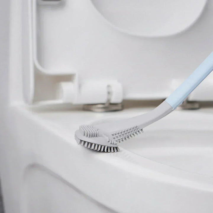 "Innovatieve toiletborstel met vuilafstotend ontwerp en L-vormige kop voor hygiënische reiniging in stijl."