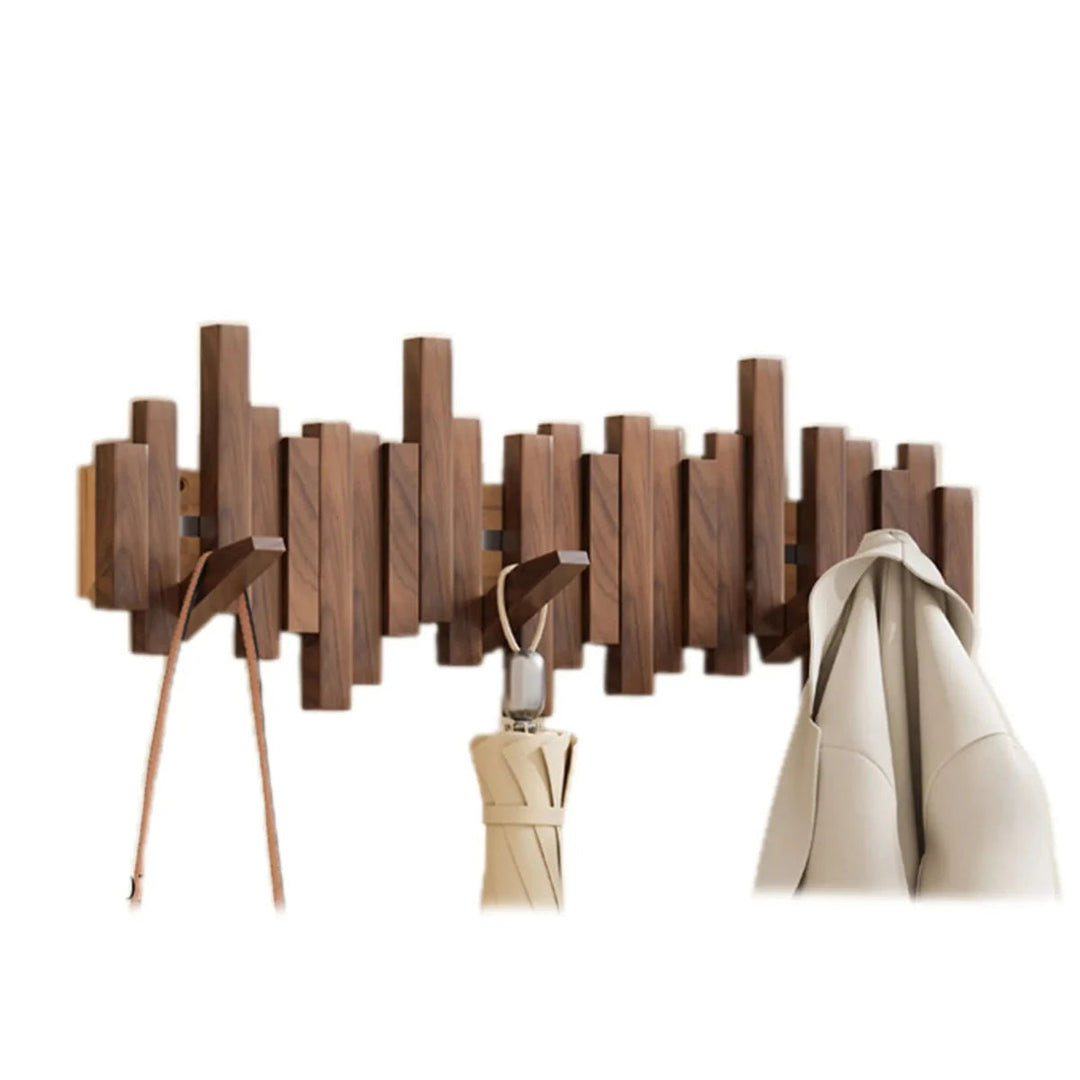 "Kapstok met pianotoetsen design in walnoot/beukenhout, artistiek en stijlvol voor een elegante interieurdecoratie."