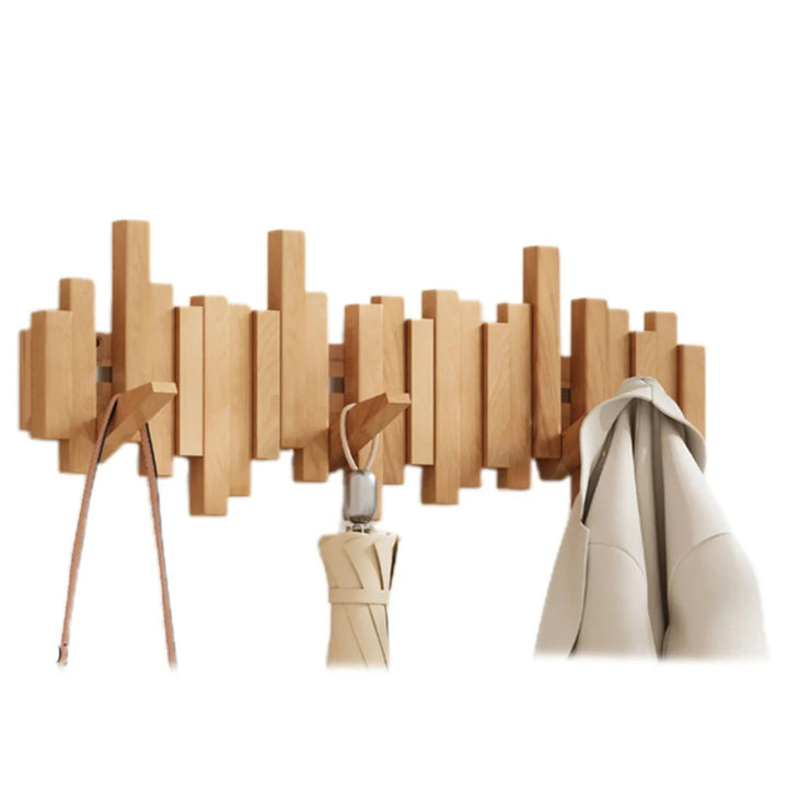"Kapstok met pianotoetsen design in walnoot/beukenhout, artistiek en stijlvol voor een elegante interieurdecoratie."