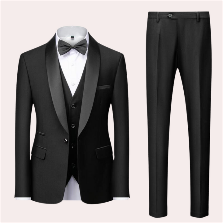 "Klassiek driedelig herenpak in zwart met satijnen revers, perfect voor zakelijke en formele gelegenheden, stijlvolle kleding