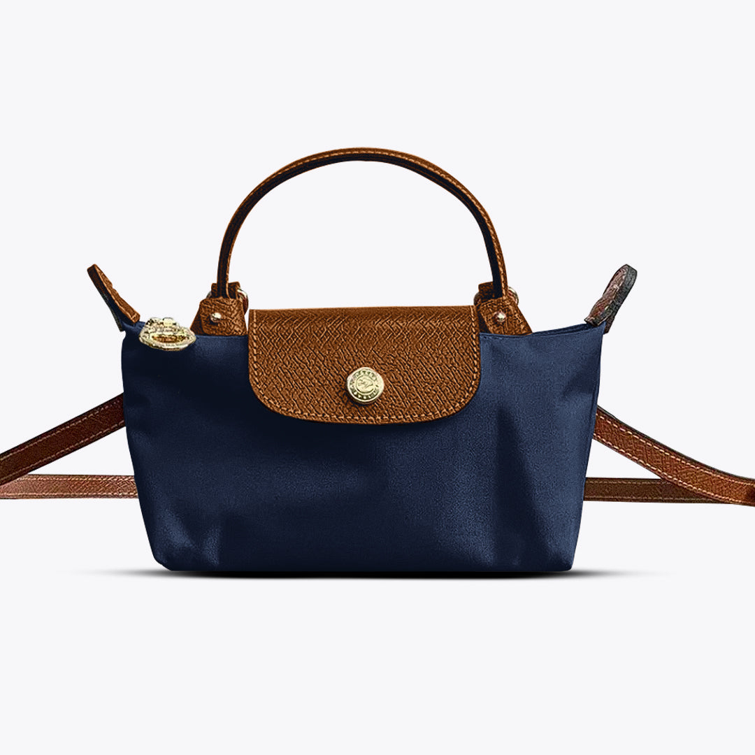 "Kleine elegante kruistas met verstelbare riem, compact design, geschikt voor elke outfit en gelegenheid, meerdere kleuren."