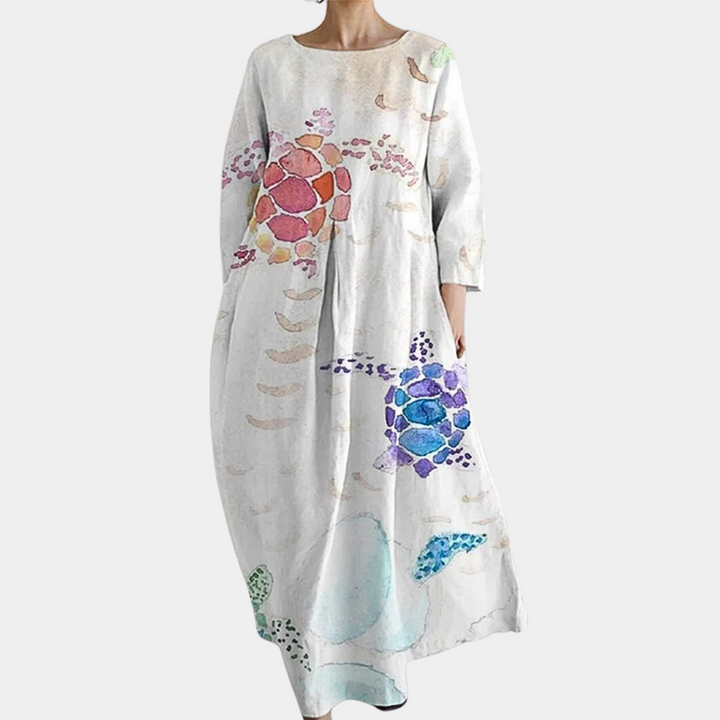 "Kleurrijke lange damesjurk voor zomer, luchtige stof, beschikbaar in vijf kleuren, elegant en casual voor elke gelegenheid."