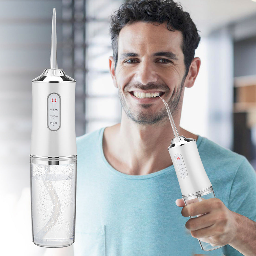 "Kleurrijke SmileFresh Waterflosser, optimale mondhygiëne met aanpasbare druk, 360° spuitkop, 220ML reservoir."