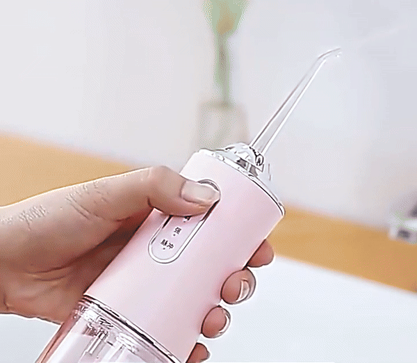 "Kleurrijke SmileFresh Waterflosser, optimale mondhygiëne met aanpasbare druk, 360° spuitkop, 220ML reservoir."