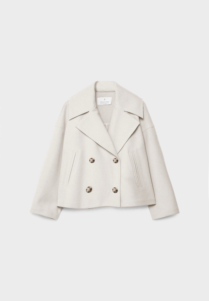 "Korte double-breasted jas, beige, regular fit, katoenmix, met knopen en zakken geschikt voor herfst- en wintermaanden."