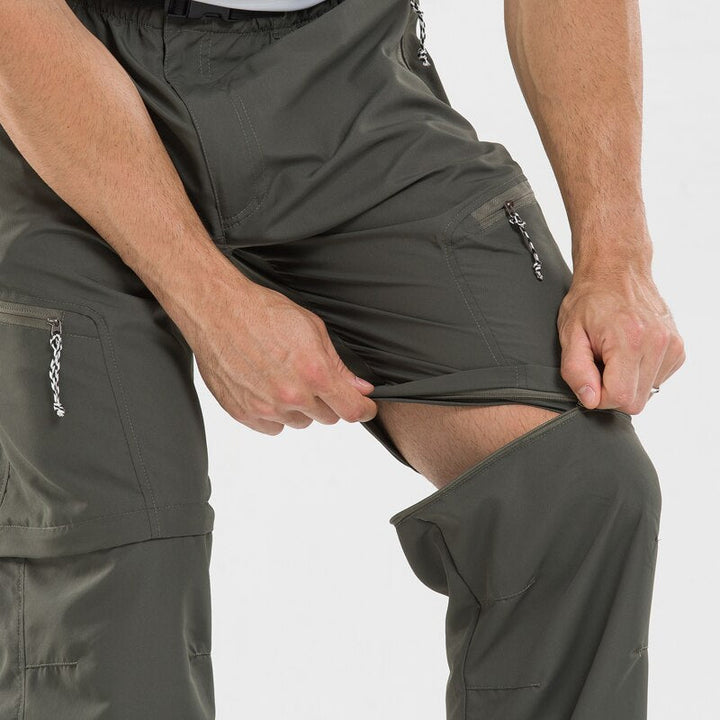 "Legergroene heren afritsbroek, outdoor comfort, veelzijdige stijl, geschikt voor wandelingen en stadsverkenningen."