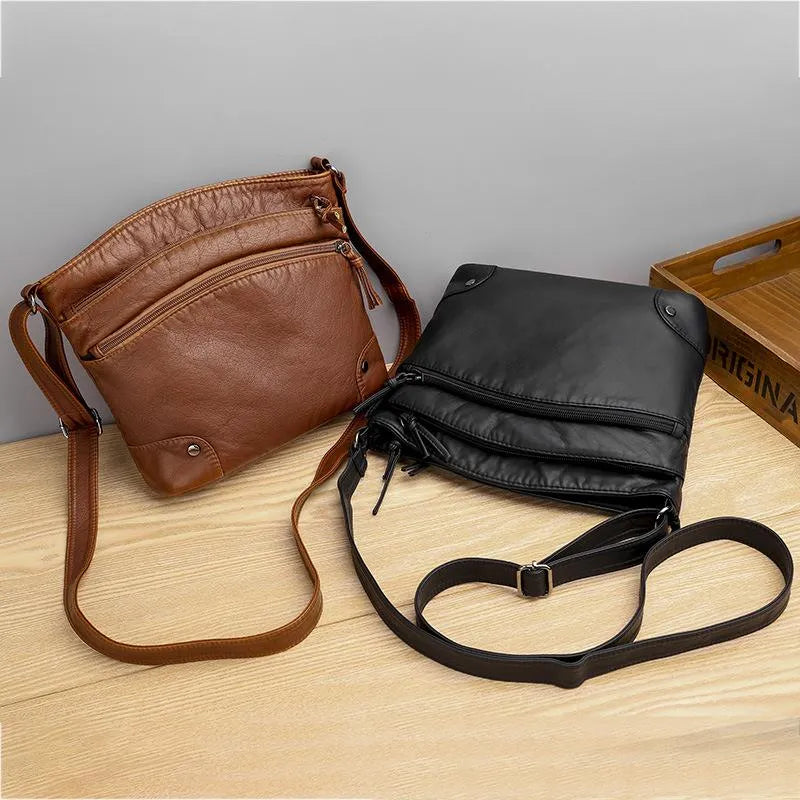 Leren schoudertas met kras- en waterbestendig leer, verstelbare riem; elegante tas voor dagelijks gebruik, zijaanzicht.