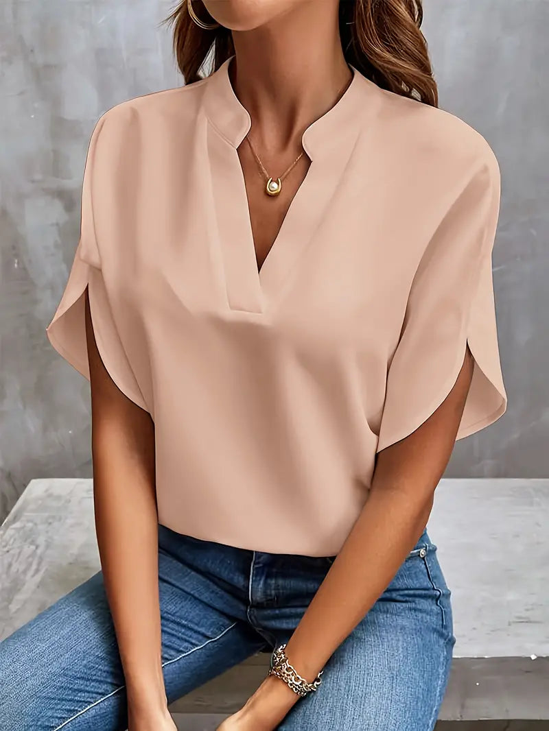"Lichtgewicht damesblouse met elegante afwerking, ademende stof, ideaal voor kantoor en casual uitjes."