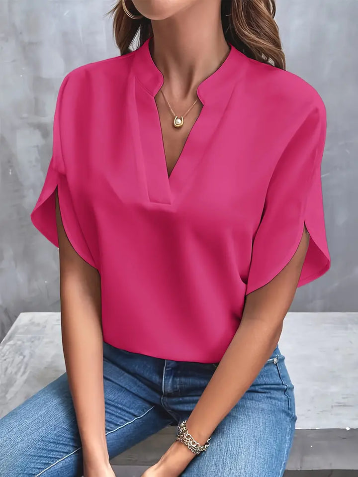 "Lichtgewicht damesblouse met elegante afwerking, ademende stof, ideaal voor kantoor en casual uitjes."