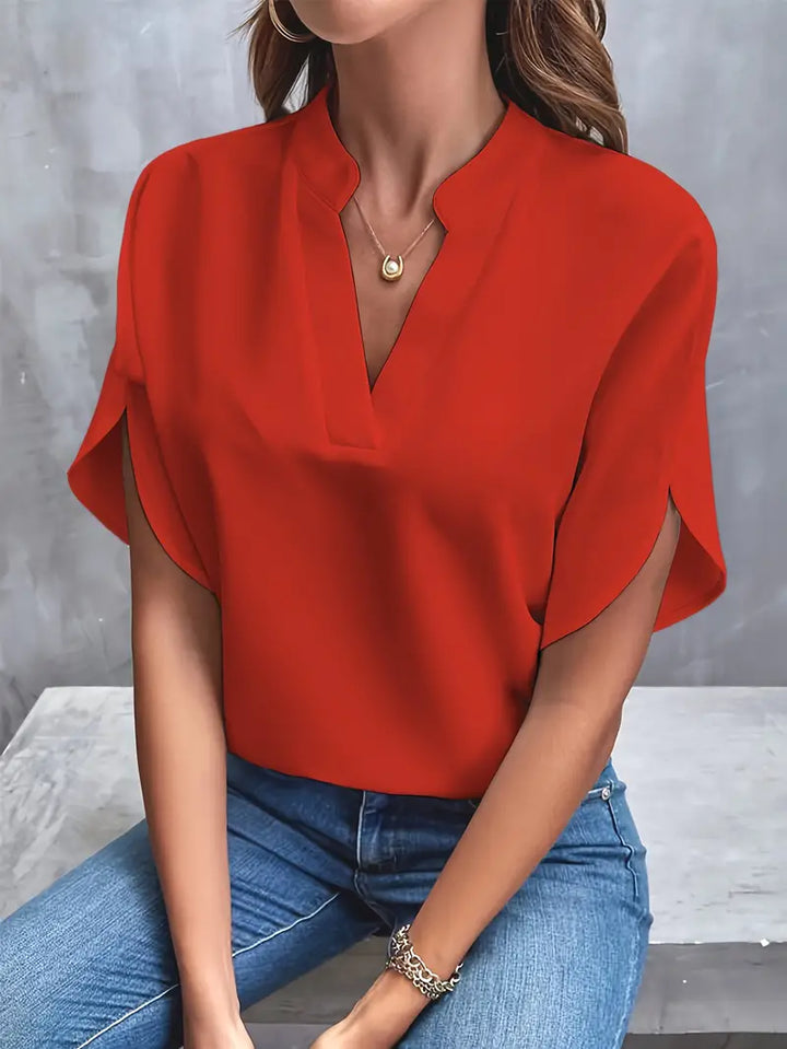"Lichtgewicht damesblouse met elegante afwerking, ademende stof, ideaal voor kantoor en casual uitjes."