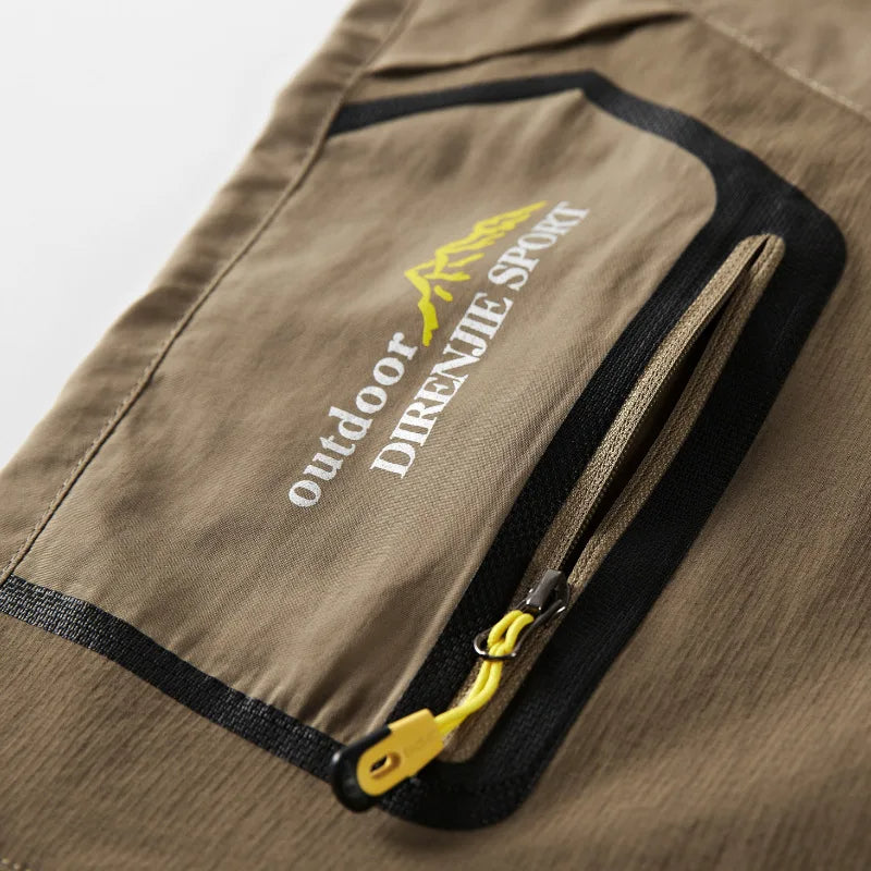 "Lichtgewicht heren outdoorbroek met afritsbare pijpen, sneldrogend en ademend, ideaal voor avontuurlijke zomerdagen."