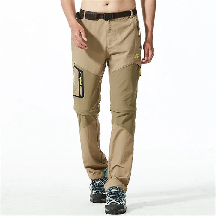 "Lichtgewicht heren outdoorbroek met afritsbare pijpen, sneldrogend en ademend, ideaal voor avontuurlijke zomerdagen."
