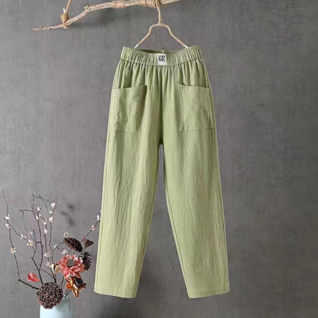 "Linnen broek heren met elastische taille, ademend en stijlvol, verkrijgbaar in groen, rood, en grijs."