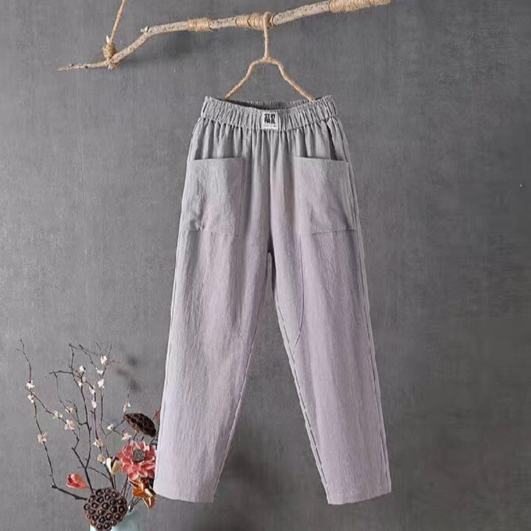 "Linnen broek heren met elastische taille, ademend en stijlvol, verkrijgbaar in groen, rood, en grijs."