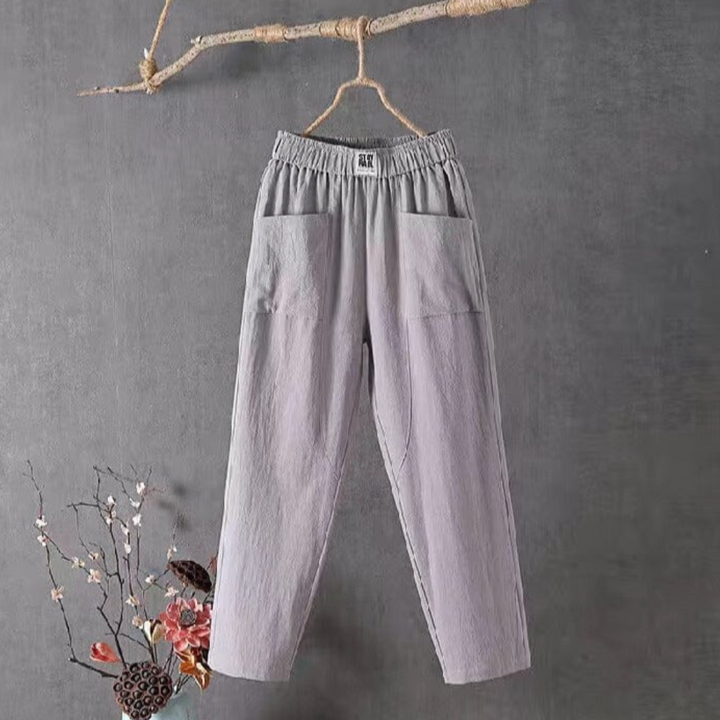 "Linnen broek heren met elastische taille, ademend en stijlvol, verkrijgbaar in groen, rood, en grijs."