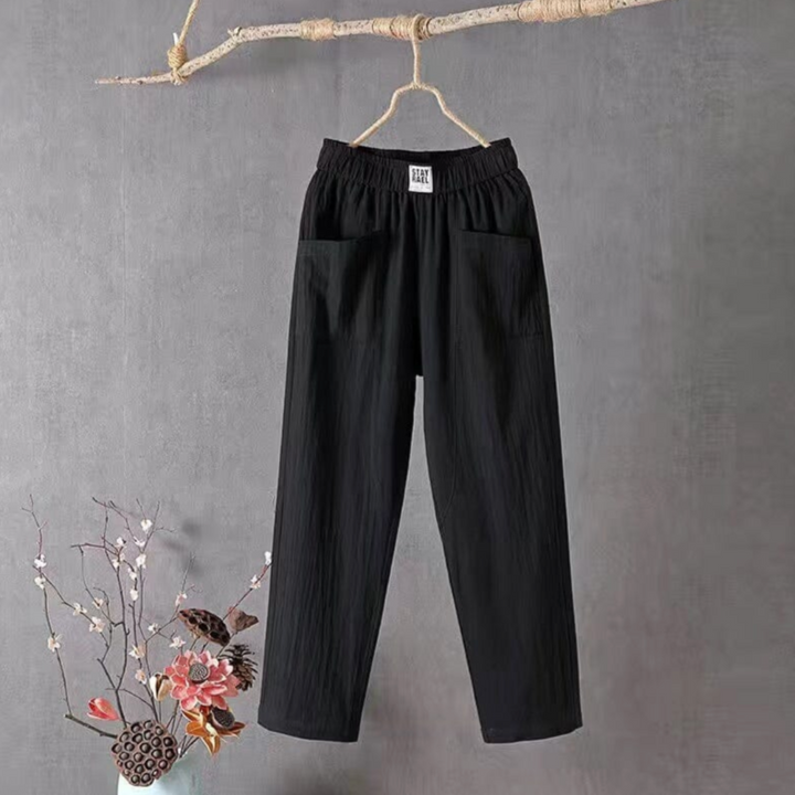 "Linnen broek heren met elastische taille, ademend en stijlvol, verkrijgbaar in groen, rood, en grijs."