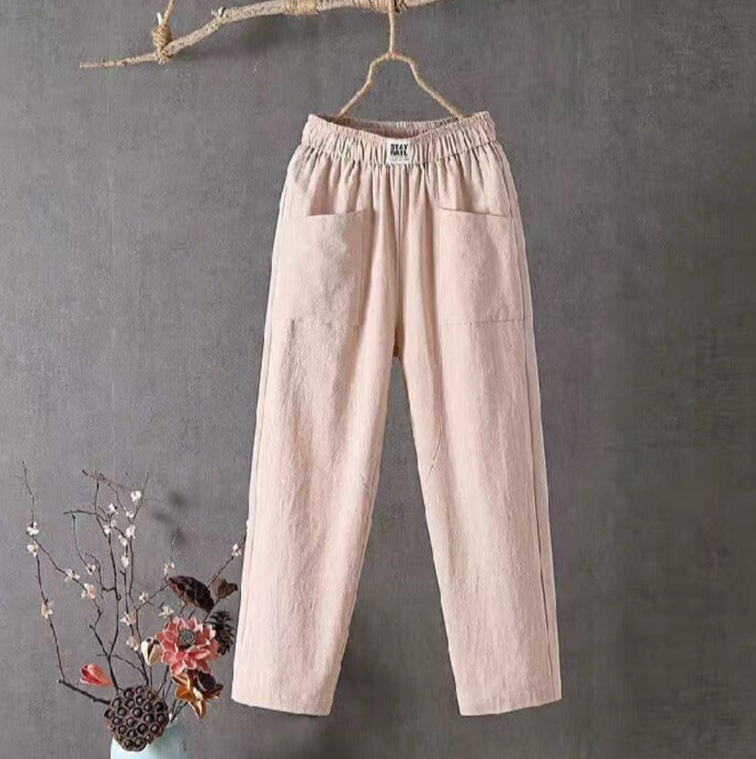"Linnen broek heren met elastische taille, ademend en stijlvol, verkrijgbaar in groen, rood, en grijs."