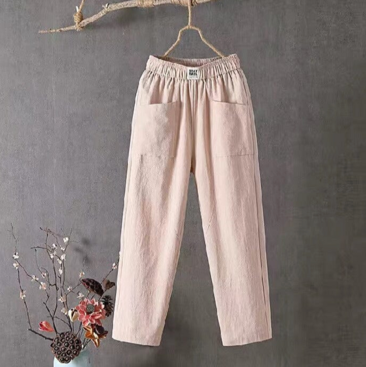"Linnen broek heren met elastische taille, ademend en stijlvol, verkrijgbaar in groen, rood, en grijs."