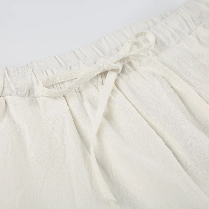 "Linnen dames zomerbroek met comfortabele pasvorm, chic design, luchtig en stijlvol, verkrijgbaar in neutrale kleuren."