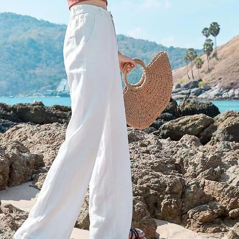 "Linnen dames zomersbroek, high waist, luchtige stof, wijde pijpen, elegant ontwerp, ideaal voor warme dagen."