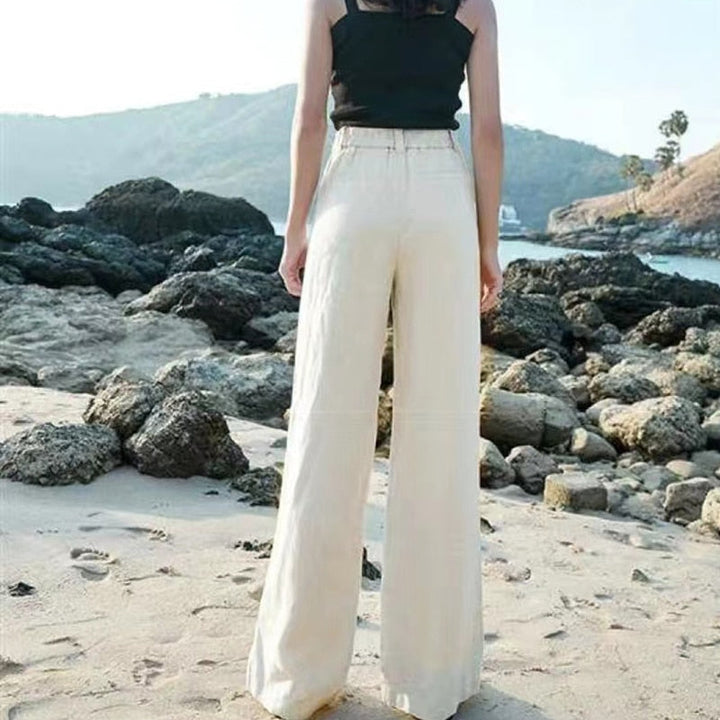 "Linnen dames zomersbroek, high waist, luchtige stof, wijde pijpen, elegant ontwerp, ideaal voor warme dagen."
