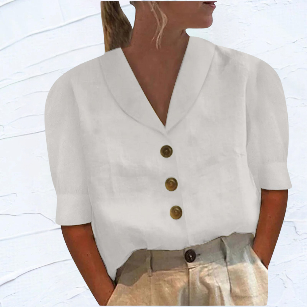 Linnen damesblouse, lang shirt met korte mouwen, gouden knopen en verfijnde kraag, in wit, elegant en luchtig design.